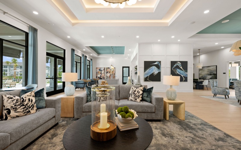 selene tomoka club lounge tv seating sofas table chandelier large windows